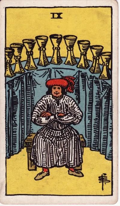 Nine of Cups, from the Rider-Waite tarot deck